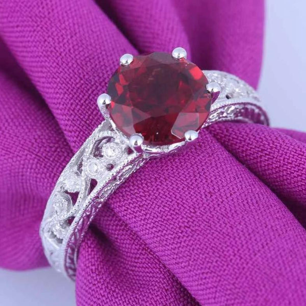 Sterling Silver Genuine Round Garnet Ring